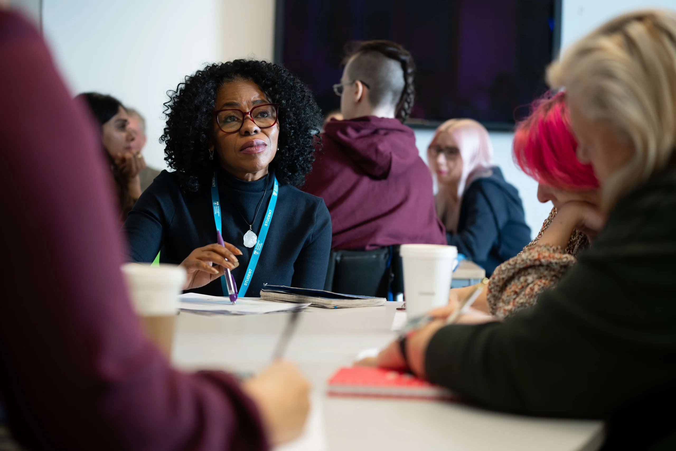 Postgraduate students in class